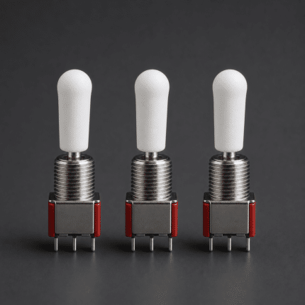Multiple toggle switches fitted with white silicone caps